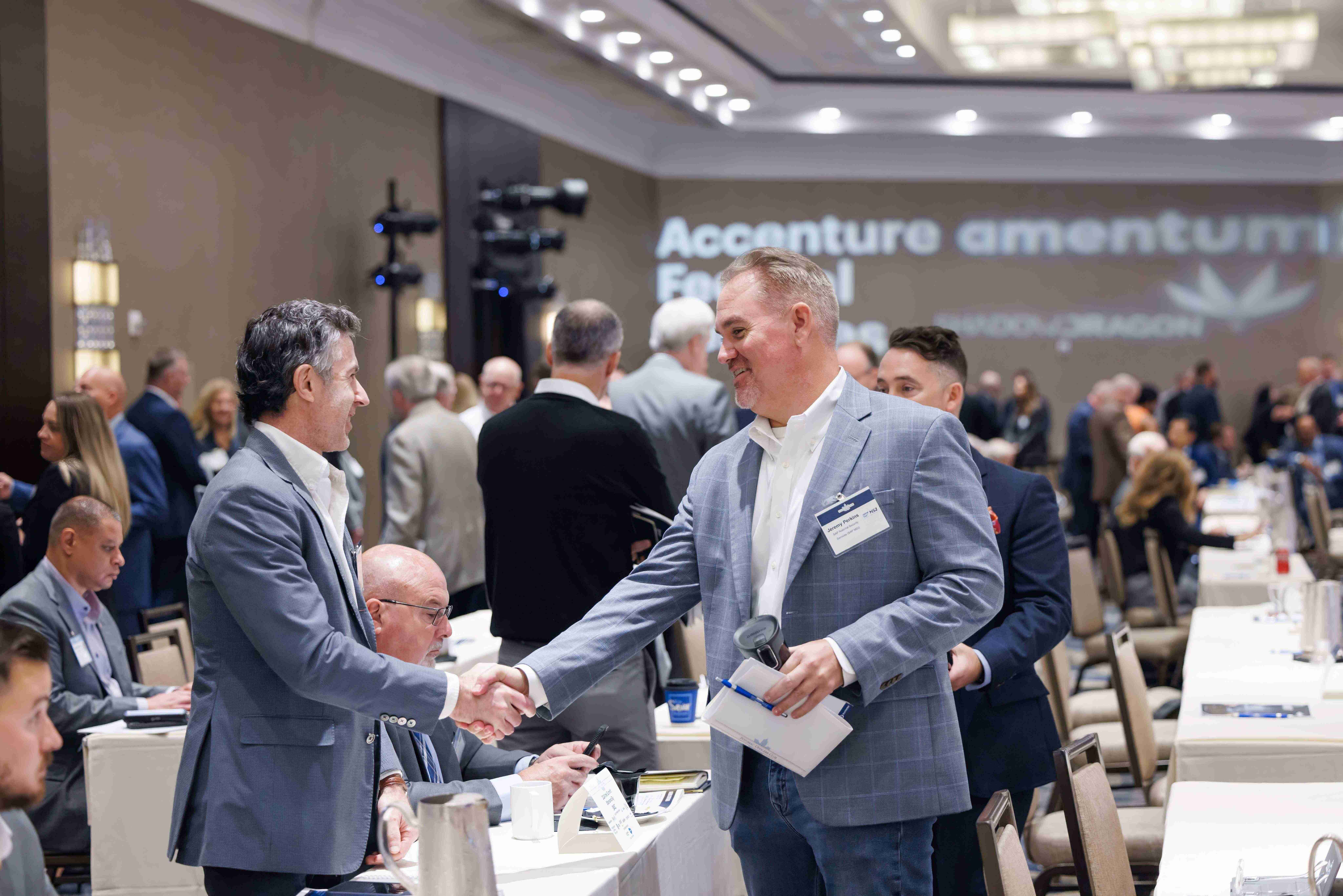 Why GovCon Executives Attend Potomac Officers Club Events GovCon networking at a Potomac Officers Club summit.