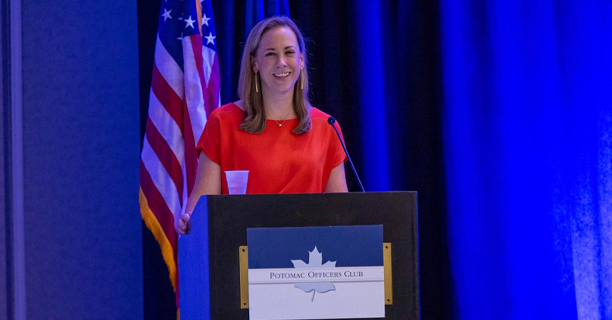 The DOD's Ashley Manning addresses the Potomac Officers Club's 2025 Cyber Summit