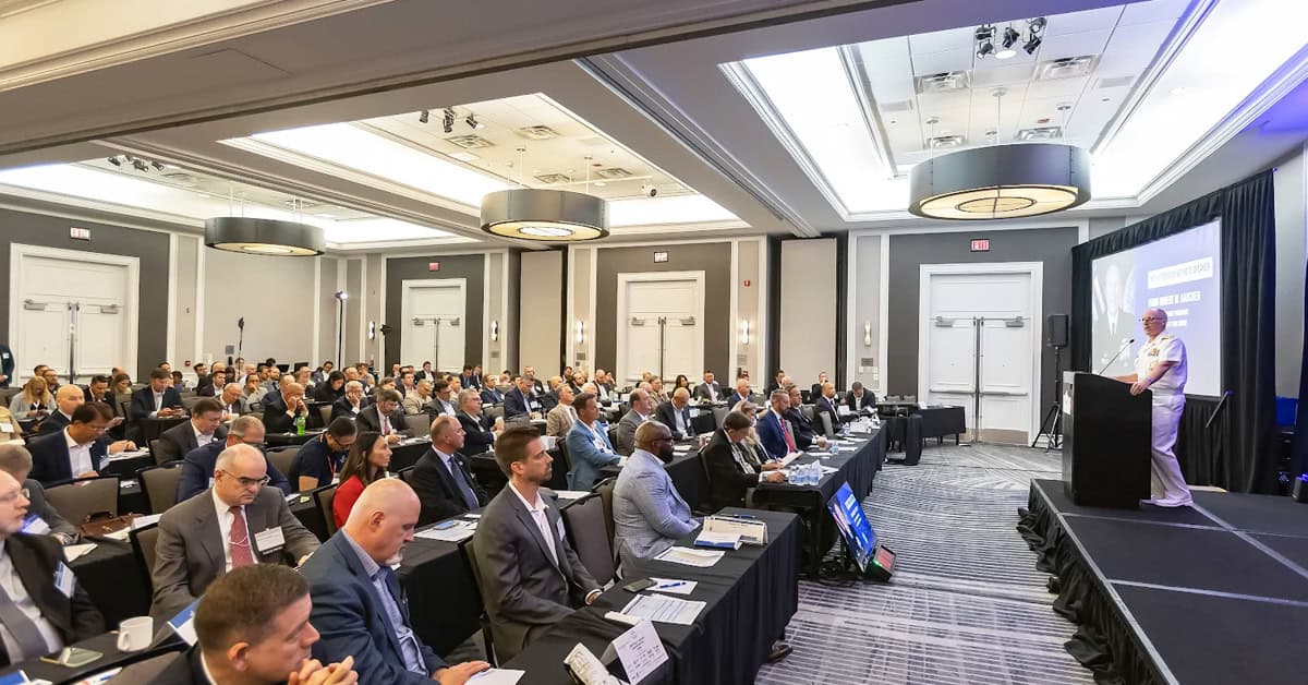 Robert Gaucher and GovCon audience. The submarine aficionado addressed a packed room of GovCon industry professionals.