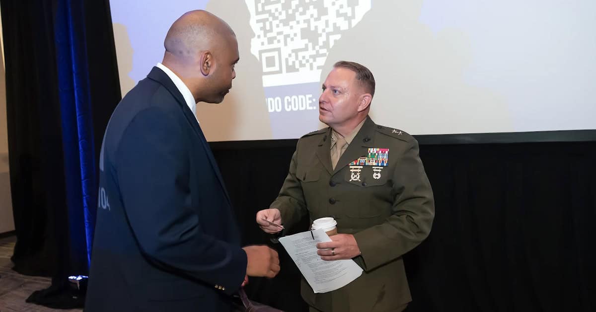mark-cunningham-govcon-networking-2026-intel-summit Mark Cunningham and GovCon industry member. The USMC intelligence official networked with participants at the 2026 Intel Summit.